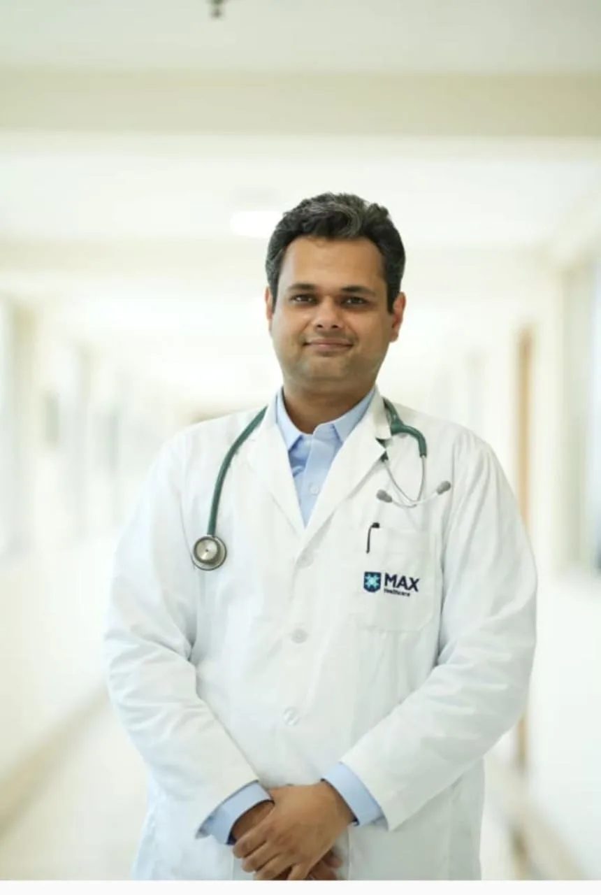 Dr Manu Madan