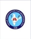 IAB - drmanumadan.com Logo of the International Association for Bronchoscopy (IAB), a blue circular emblem with a stylized red-and-white lungs graphic at the center.